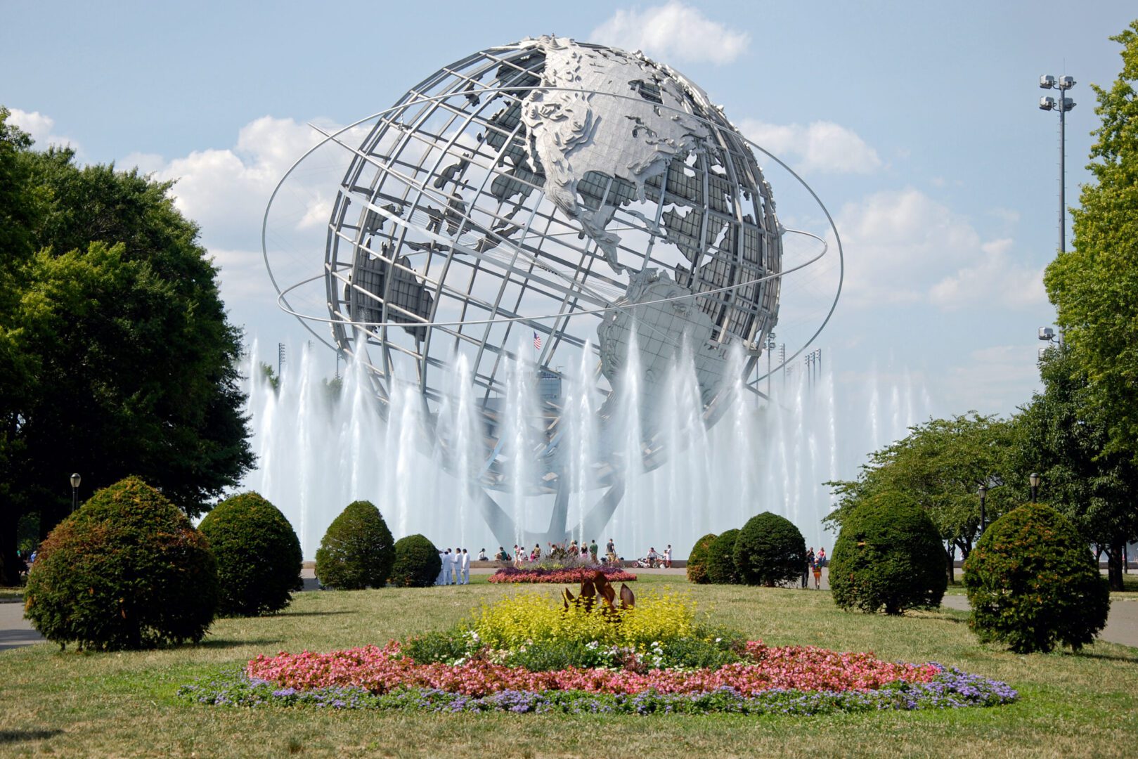 The unisphere, a spherical steel representation of the earth, located in flushing meadows–corona park in queens, new york, surrounded by fountains.